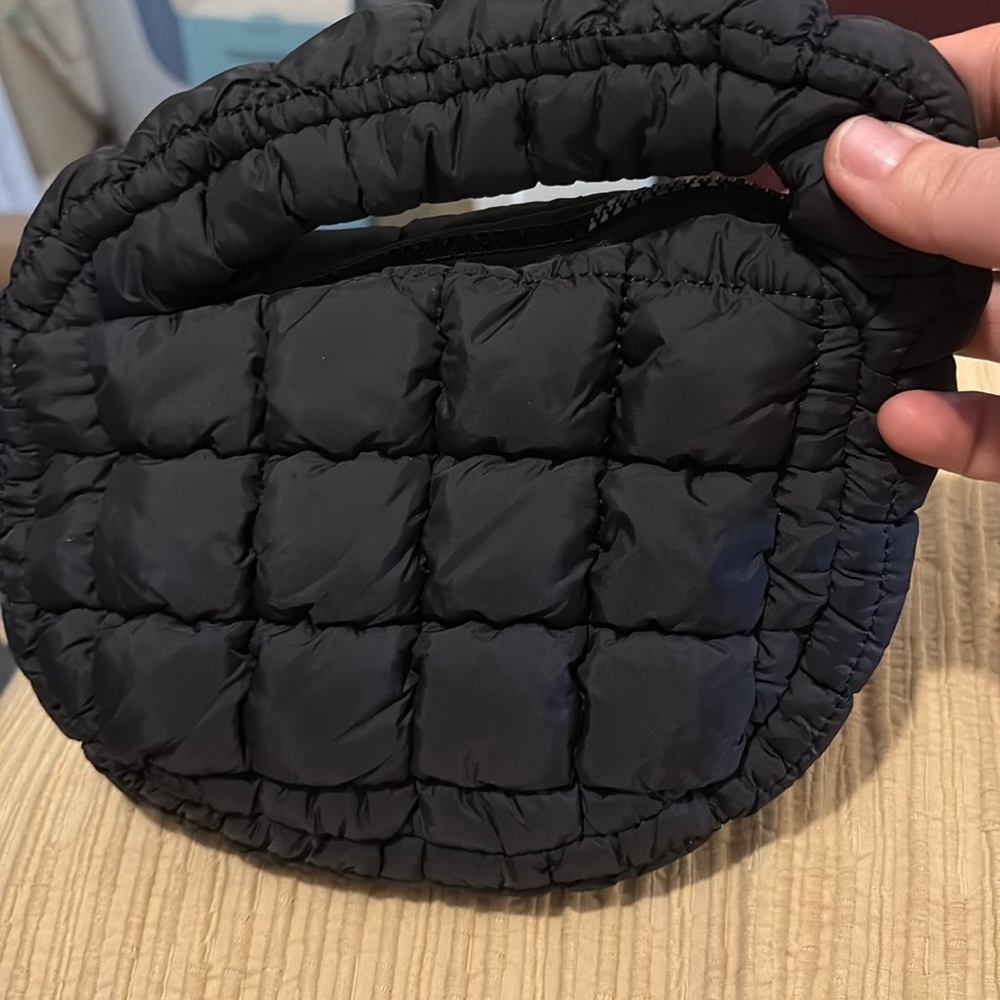 Puffer hand bag in black. So cute!! New without tags!